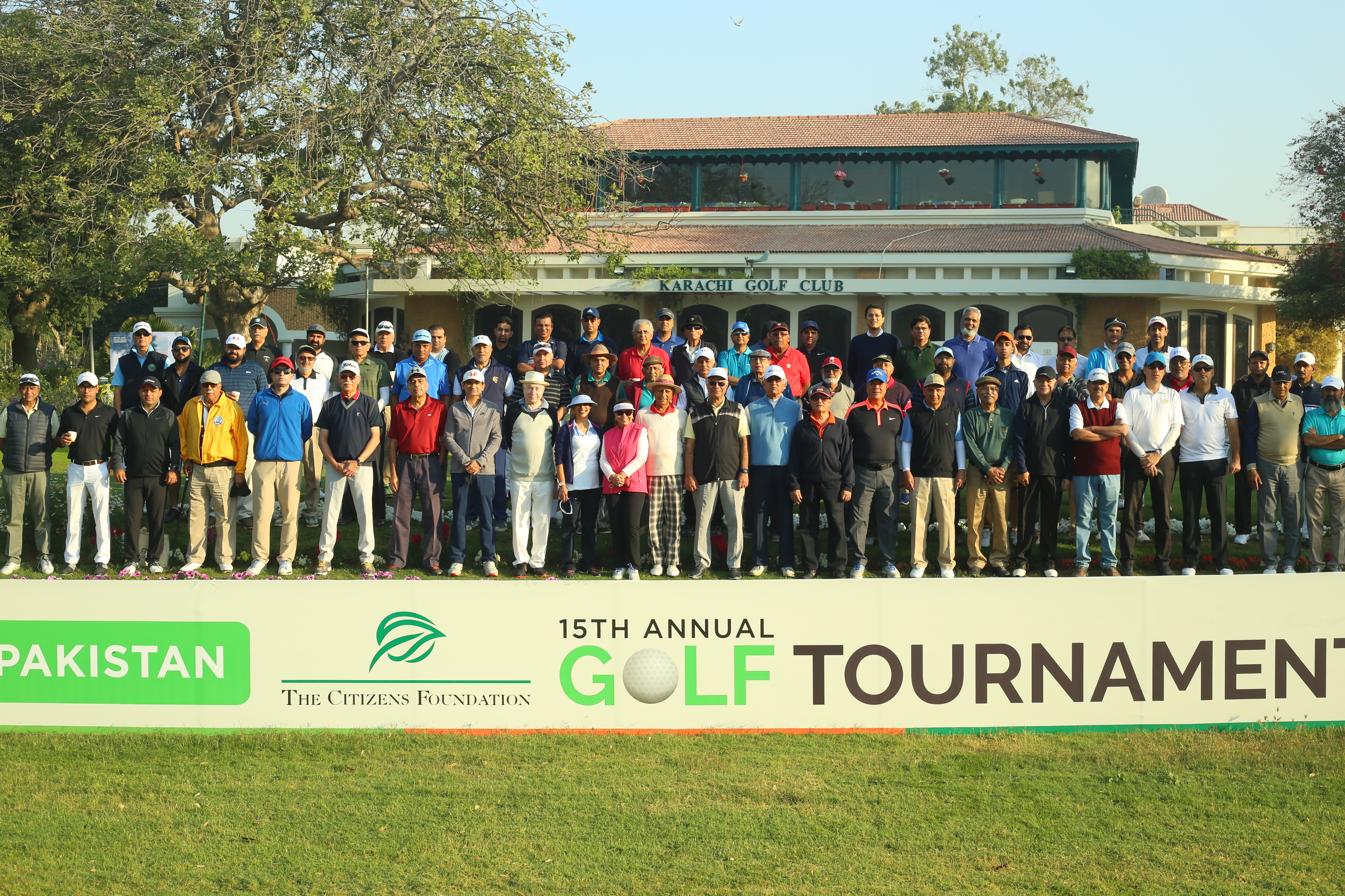 28 team of golfers at 15th TCF Golf tournament before tee off